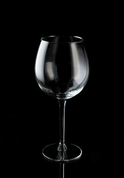 empty wine glass on a black background