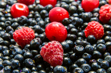 Raspberries, cherries and blueberries