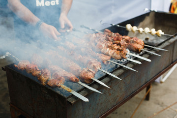 Grilled kebab on metal skewer, barbecue