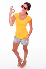 Happy smiling brunette with red sunglasses