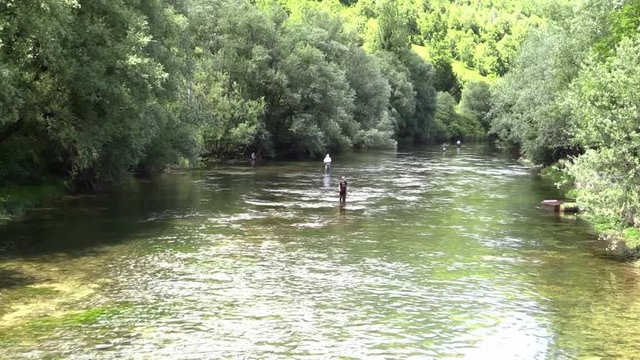 fisherman fly fishing