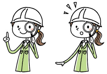 ヘルメットをかぶった作業服の女性　虫眼鏡
