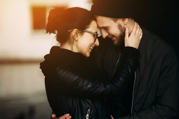 couple posing in backstreet