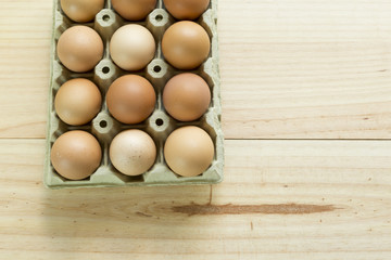 Chicken eggs in an egg cup