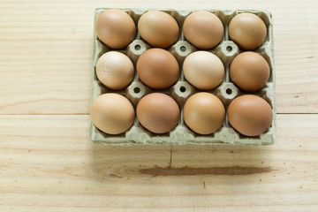 Chicken eggs in an egg cup