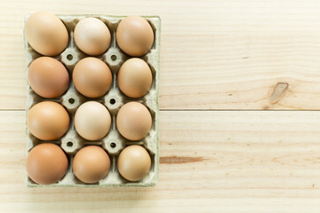 Chicken eggs in an egg cup