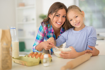 Mother And Daugter In Kitchen