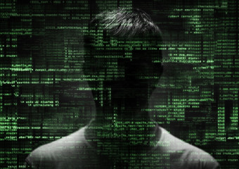 hacker at work with graphic user interface around