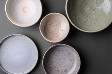ceramic bowls on grey background