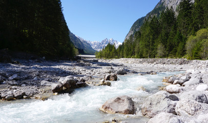 Beautiful clear river at the valley of Wimbachgries with blue sk