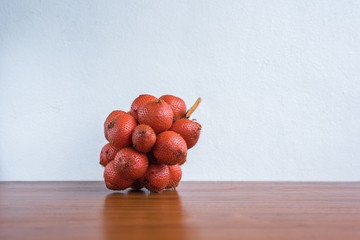 Close-up Salak (Zalacca) on a wood table