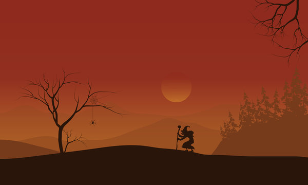 Silhouette of Halloween witch lonely