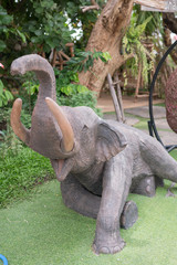 wood elephant in the garden