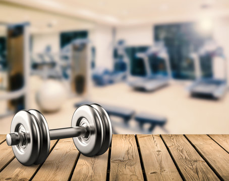 metal dumbbell with gym background Stock Photo | Adobe Stock