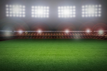 Fototapeta na wymiar empty soccer field with stadium at night