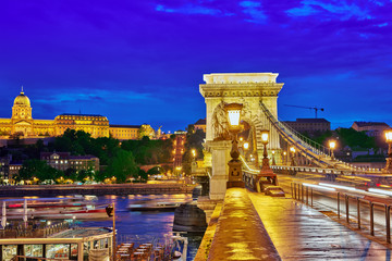 Budapest Royal Castle and Szechenyi Chain Bridge at dusk time fr