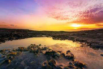 Fototapeta na wymiar Tropical beach at sunset. color sunset on beach