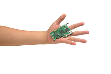 Electronic components in hand holding isolated on white