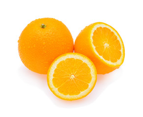 Fototapeta na wymiar Orange fruit with drops isolated on white background