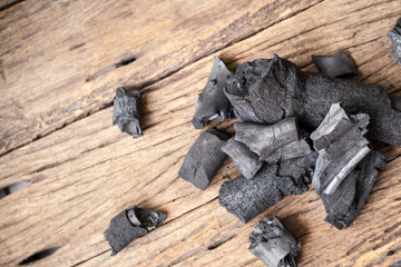 charcoal on wooden background