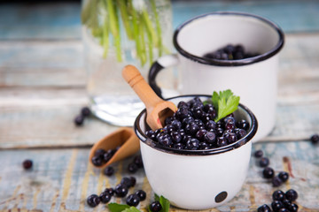 Fototapeta na wymiar fresh bilberry in cup