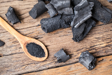 charcoal on wooden background