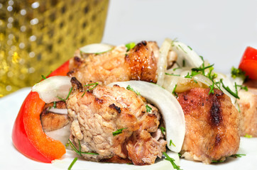 Kebab plate with red pepper and onion