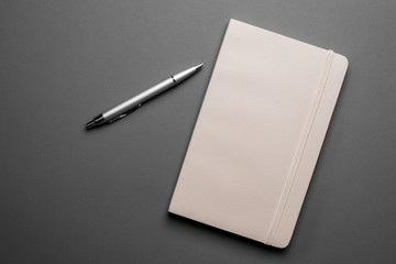 A notebook and pen