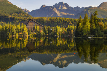 Fototapeta premium beautiful autumn morning over a mountain lake Strbske Pleso in the Tatra Mountains in Slovakia 