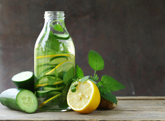 detox drink with fresh cucumber, lemon and ginger, healthy eating and diet