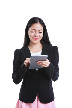 Asian woman holding tablet computer isolated on white background