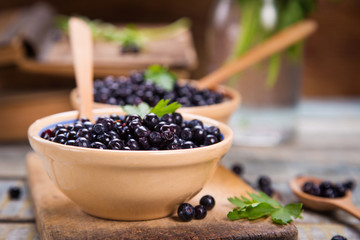 fresh bilberry in dish