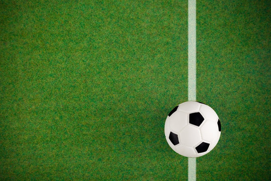 Soccer football field grass ball background. Flat lay. Top view