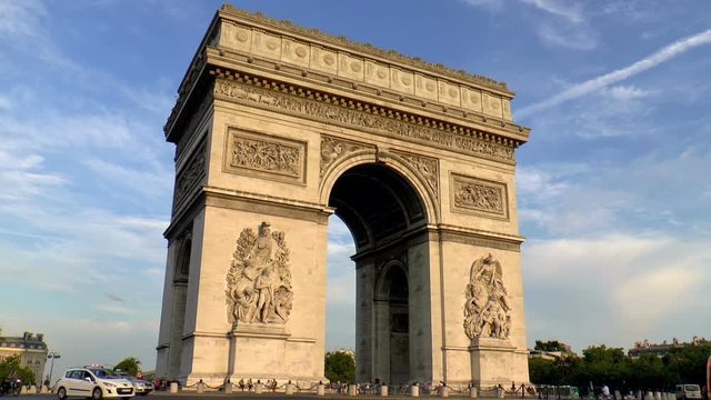 Arc De Triumph at sunset, seen from Champs Elysees, Paris, France