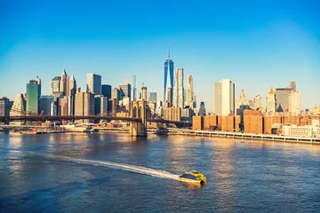 Tuinposter Brooklyn bridge and Manhattan at sunny day, New York City © sborisov