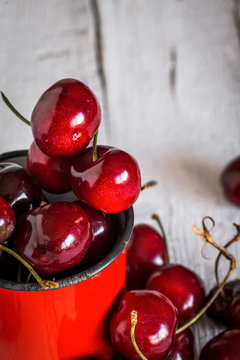 fresh cherries on wooden table