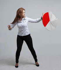 Woman shows a pie chart, circle diagram. Business analytics concept.