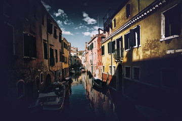 Obraz premium Street scene with canal in Venice, Italy