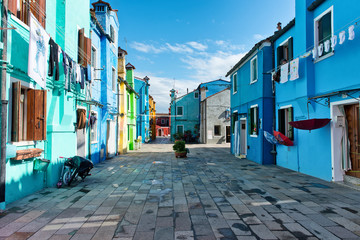 Fototapeta na wymiar Pedestrian walkway with colorful houses, Burano