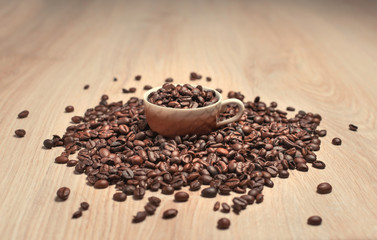 Coffee beans in cup