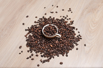 Coffee beans in cup