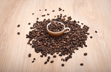 Coffee beans in cup