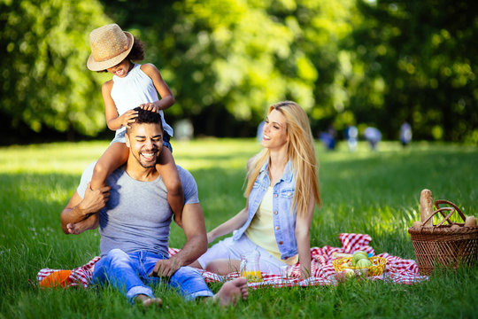 Beautiful cheerful faimly outdoors