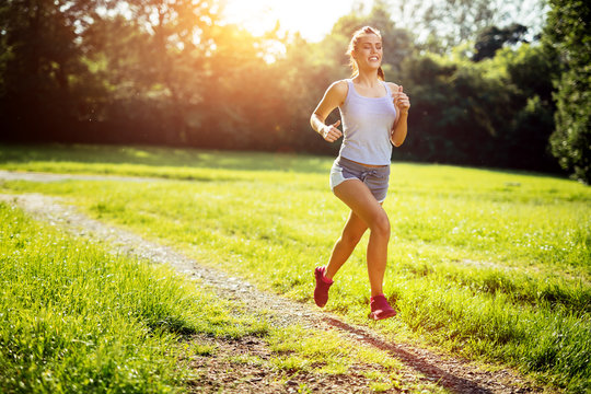 Healthy woman jogging early in the morning