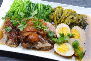The pork leg stewed in the gravy. A favorite fast food menu of Thai food.
