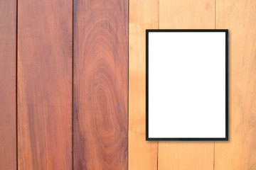 Mock up blank poster picture frame on wood wall.