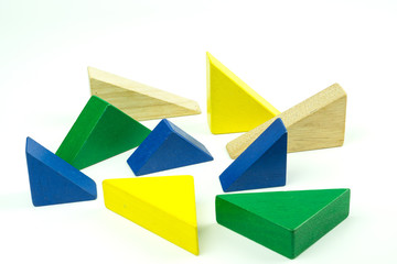 Wooden colorful bricks isolated on white background. Wooden toy