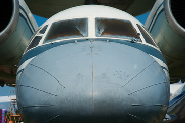 Fototapeta na wymiar nose of the old Soviet passenger plane