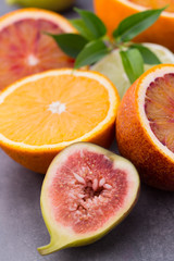 Bloody Sicilian oranges and figs. Shallow depth of field.