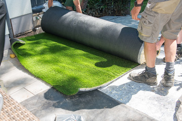 professional gardeners are rolling out artificial turf